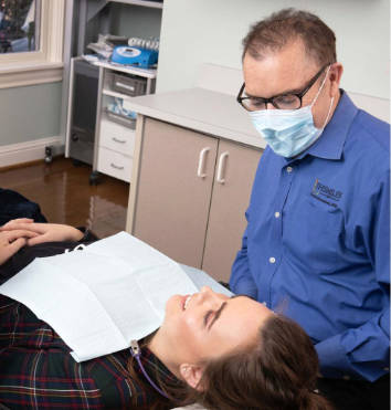 Dr-Randy-working-on-patient