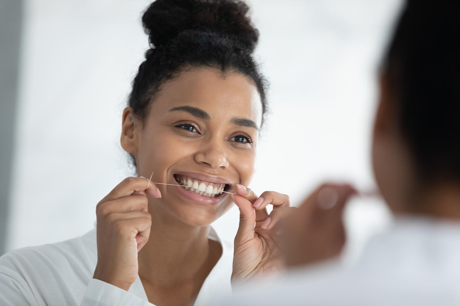 Woman-flossing