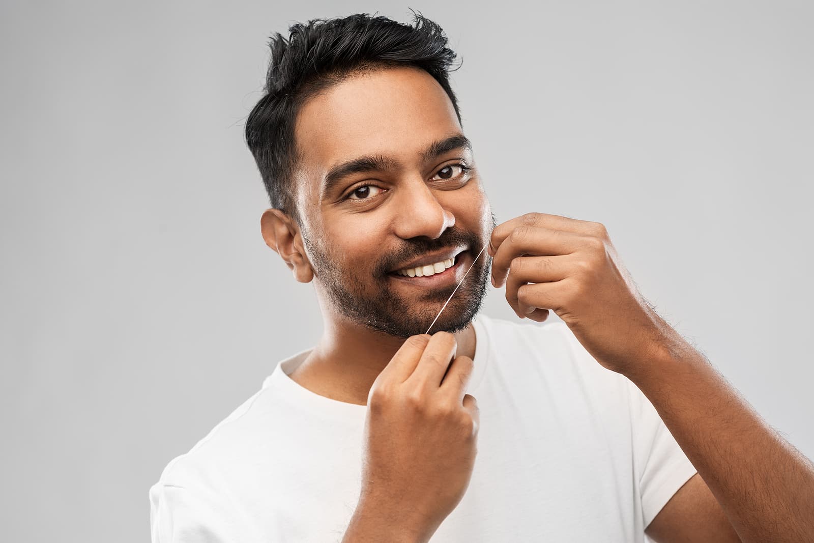 Gum-Health-Man-Flossing